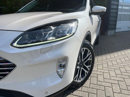Ford Kuga 2.5 PHEV Titanium X | Lichtmetalen velgen 18" | Navigatiesysteem full map | Panorama dak ActivLease financial lease