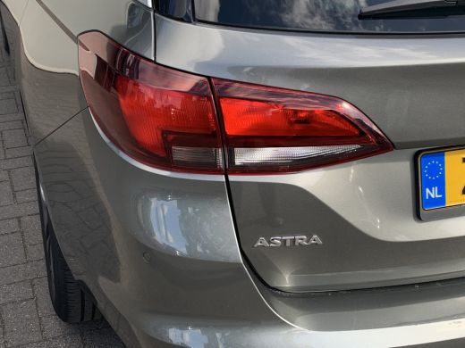 Opel Astra Sports Tourer 1.0 Turbo 120 Jaar Edition Airco | Cruise Control | DAB | LMV 16" | Navi | PDC V&A | ActivLease financial lease