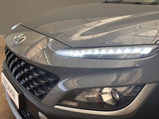 Hyundai Kona 1.0 T-GDI Stuur/Stoelverwarming | Carplay | Parkeersensoren | Camera | Digitaal Dashboard | 16" L... ActivLease financial lease