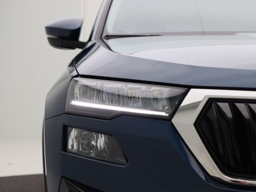Skoda Karoq 1.0 TSi Ambition | Airco | Cruise Control | Carplay | Sensoren | Keyless | 16 Inch | 38.461 Km ActivLease financial lease
