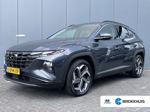 Hyundai Tucson 1.6 T-GDI 265pk PHEV Comfort Smart 4WD | Climate | Camera | Carplay | Keyless | Navigatie | Full ... Hyundai Tucson 1.6 T-GDI 265pk PHEV Comfort Smart 4WD | Climate | Camera | Carplay | Keyless | Navigatie | Full ...