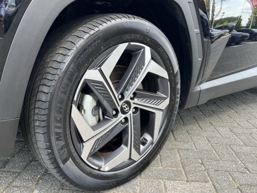 Hyundai Tucson 1.6 T-GDI 265pk PHEV Premium 4WD | Leder | Carplay | Climate | Keyless | Navigatie | Elek. Klep |... ActivLease financial lease