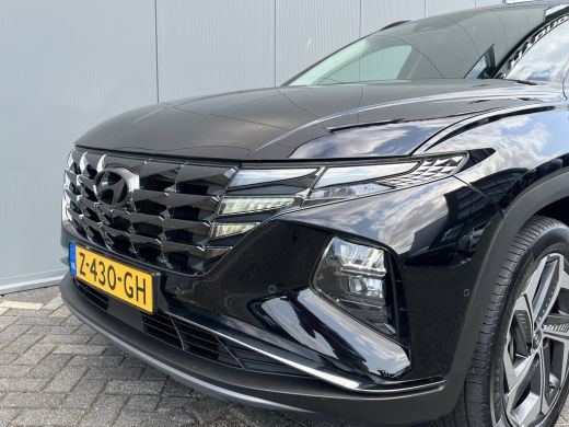 Hyundai Tucson 1.6 T-GDI 265pk PHEV Premium 4WD | Leder | Carplay | Climate | Keyless | Navigatie | Elek. Klep |... ActivLease financial lease