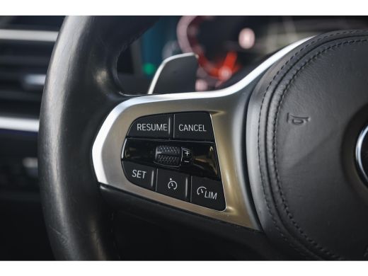 BMW 3 Serie 320i High Executive M Sport Automaat / Schuif-Kanteldak / Sportstoelen / Achteruitrijcamera / M A... ActivLease financial lease