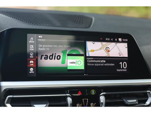 BMW 3 Serie 320i High Executive M Sport Automaat / Schuif-Kanteldak / Sportstoelen / Achteruitrijcamera / M A... ActivLease financial lease