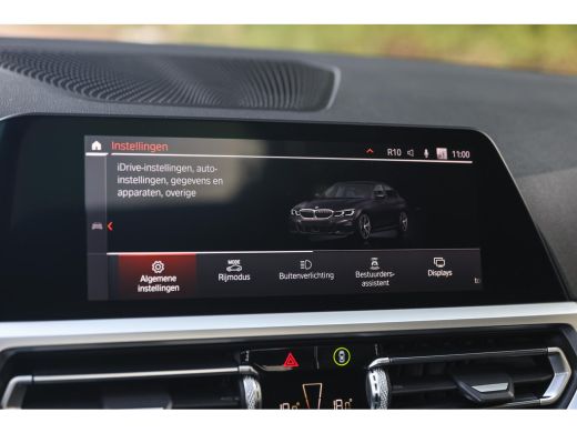 BMW 3 Serie 320i High Executive M Sport Automaat / Schuif-Kanteldak / Sportstoelen / Achteruitrijcamera / M A... ActivLease financial lease
