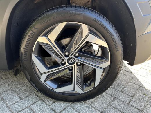 Hyundai Tucson 1.6 T-GDI PHEV Premium 4WD | Rijklaarprijs dus GEEN afleverkosten! | 360 camera | Verwarmde en ge... ActivLease financial lease