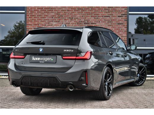 BMW 3 Serie Touring 330e xDrive M-Sport Pro LCI Dravitgrau Pano HUD el-zetels 19inch ActivLease financial lease