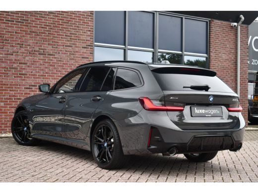 BMW 3 Serie Touring 330e xDrive M-Sport Pro LCI Dravitgrau Pano HUD el-zetels 19inch ActivLease financial lease