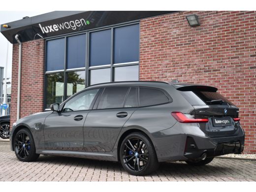 BMW 3 Serie Touring 330e xDrive M-Sport Pro LCI Dravitgrau Pano HUD el-zetels 19inch ActivLease financial lease