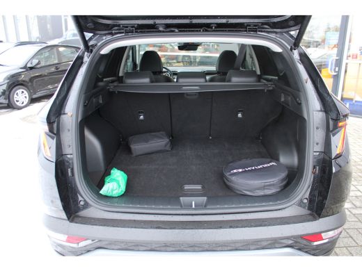 Hyundai Tucson 1.6 T-GDI 265pk PHEV Premium Sky 4WD | DEMO DEAL: 299,- P/M! | Schuifkanteldak | 360 camera | Led... ActivLease financial lease