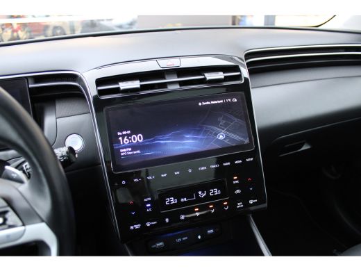 Hyundai Tucson 1.6 T-GDI 265pk PHEV Premium Sky 4WD | DEMO DEAL: 299,- P/M! | Schuifkanteldak | 360 camera | Led... ActivLease financial lease