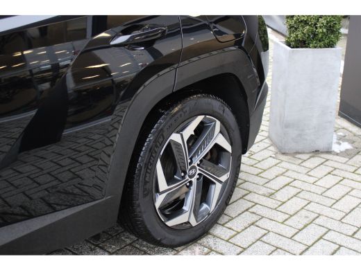 Hyundai Tucson 1.6 T-GDI 265pk PHEV Premium Sky 4WD | DEMO DEAL: 299,- P/M! | Schuifkanteldak | 360 camera | Led... ActivLease financial lease