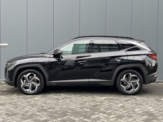 Hyundai Tucson 1.6 T-GDI 265pk PHEV Premium Sky 4WD | Leder | Carplay | Climate | Keyless | Navigatie | Elek. Kl... ActivLease financial lease