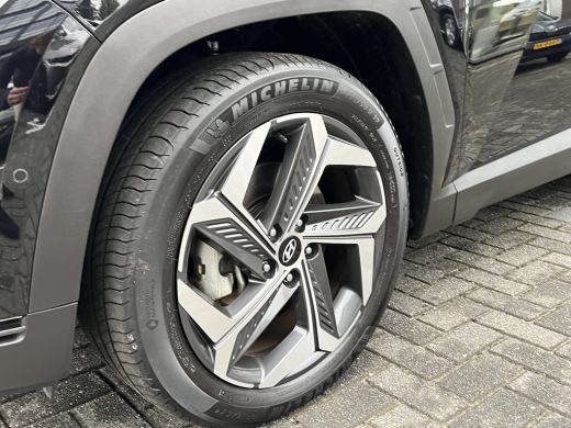 Hyundai Tucson 1.6 T-GDI 265pk PHEV Premium Sky 4WD | Leder | Carplay | Climate | Keyless | Navigatie | Elek. Kl... ActivLease financial lease