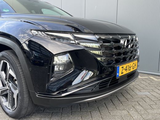 Hyundai Tucson 1.6 T-GDI 265pk PHEV Premium 4WD | Leder | Carplay | Climate | Keyless | Navigatie | Elek. Klep |... ActivLease financial lease