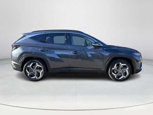 Hyundai Tucson 1.6 T-GDI PHEV Comfort Smart 4WD | Rijklaarprijs! | Trekhaak | Achteruitrijcamera | Stoel & stuur... ActivLease financial lease
