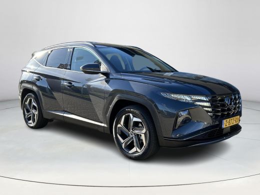 Hyundai Tucson 1.6 T-GDI PHEV Comfort Smart 4WD | Rijklaarprijs! | Trekhaak | Achteruitrijcamera | Stoel & stuur... ActivLease financial lease