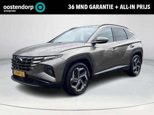 Hyundai Tucson Hybrid 1.6 T-GDI HEV Premium | Rijklaarprijs! | Trekhaak 1.650kg! | Leder |  Climate Control 3 zone | Ad...