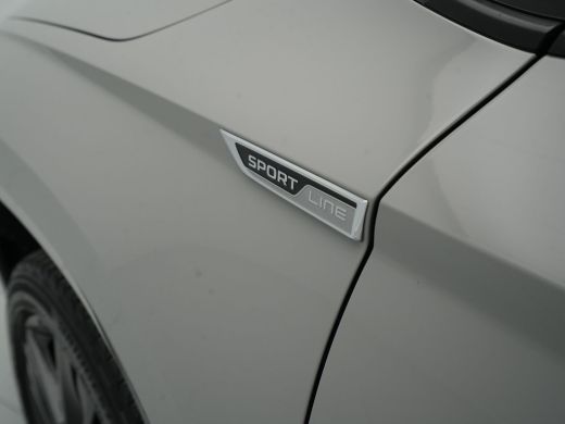 Skoda Karoq 1.5 TSI ACT 150pk DSG Sportline Business Navigatie CantonSound Stoelverwarming Camera Carplay Sid... ActivLease financial lease