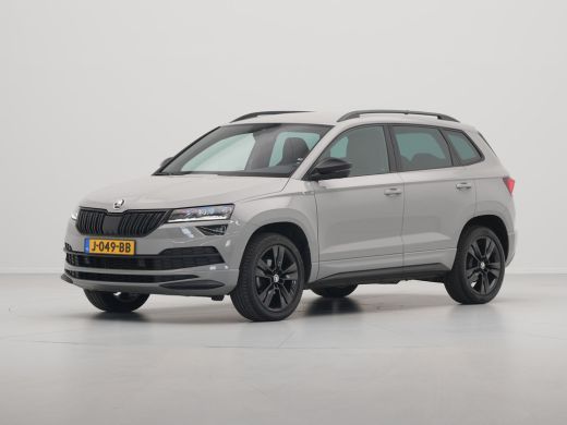 Skoda Karoq 1.5 TSI ACT 150pk DSG Sportline Business Navigatie CantonSound Stoelverwarming Camera Carplay Sid... ActivLease financial lease