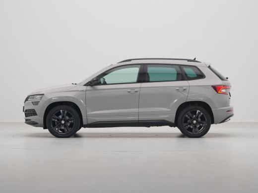 Skoda Karoq 1.5 TSI ACT 150pk DSG Sportline Business Navigatie CantonSound Stoelverwarming Camera Carplay Sid... ActivLease financial lease