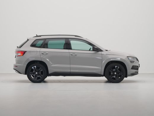 Skoda Karoq 1.5 TSI ACT 150pk DSG Sportline Business Navigatie CantonSound Stoelverwarming Camera Carplay Sid... ActivLease financial lease