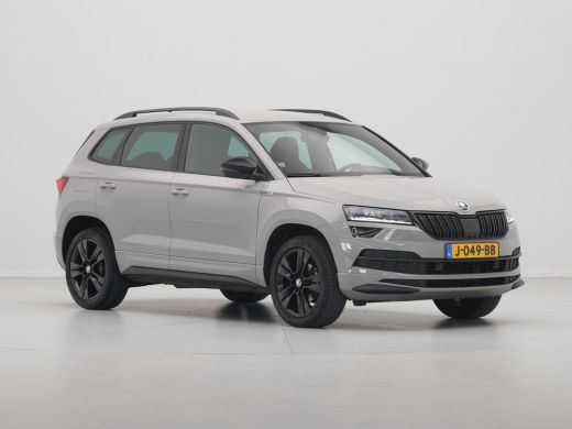 Skoda Karoq 1.5 TSI ACT 150pk DSG Sportline Business Navigatie CantonSound Stoelverwarming Camera Carplay Sid... ActivLease financial lease