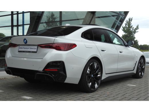 BMW i4 eDrive40 High Executive M Sport / Schuif-kanteldak / Comfort Access / Stoelverwarming / Adaptieve... ActivLease financial lease