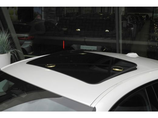 BMW i4 eDrive40 High Executive M Sport / Schuif-kanteldak / Comfort Access / Stoelverwarming / Adaptieve... ActivLease financial lease
