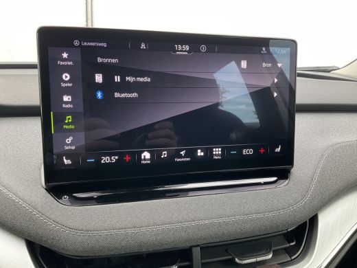 Skoda Enyaq iV 80 Trekhaak Stoel/Stuurverw Carplay Warmtepomp Trekhaak 100% Elektrisch NL-Auto! ActivLease financial lease