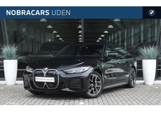 BMW i4 eDrive40 High Executive M Sport / Achteruitrijcamera / Stoelverwarming / Cruise Control / Aircond... BMW i4 eDrive40 High Executive M Sport / Achteruitrijcamera / Stoelverwarming / Cruise Control / Aircond...