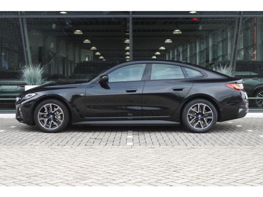 BMW i4 eDrive40 High Executive M Sport / Achteruitrijcamera / Stoelverwarming / Cruise Control / Aircond... ActivLease financial lease