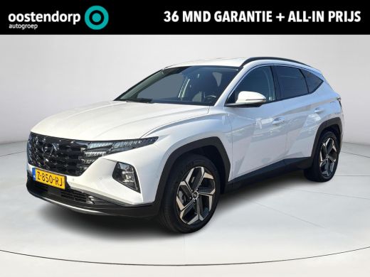 Hyundai Tucson 1.6 T-GDI PHEV Premium 4WD | Rijklaarprijs ! | Elek. stoelen met geheugen | Stoel + stuurverwarmi... Hyundai Tucson 1.6 T-GDI PHEV Premium 4WD | Rijklaarprijs ! | Elek. stoelen met geheugen | Stoel + stuurverwarmi...