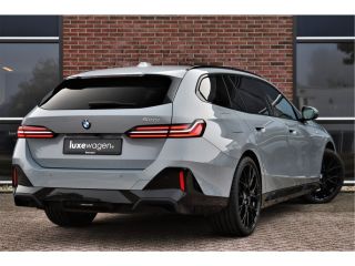 BMW 5 Serie Touring 520i M-Sport Pano Trekh ACC 360 H/K HUD 21inch Stoelventilatie