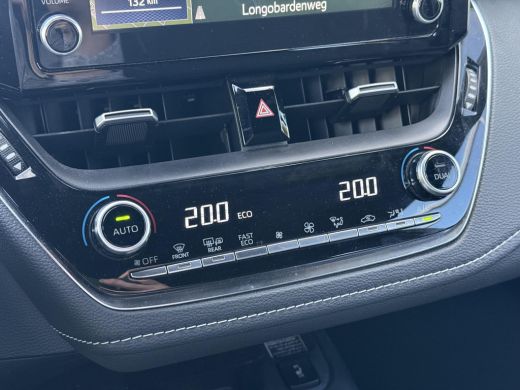 Toyota Corolla Touring Sports 1.8 Hybrid Style **NAVIGATIE/ HEAD-UP DISPLAY/ STOELVERWARMING/ 36 MAANDEN GARANTIE** ActivLease financial lease
