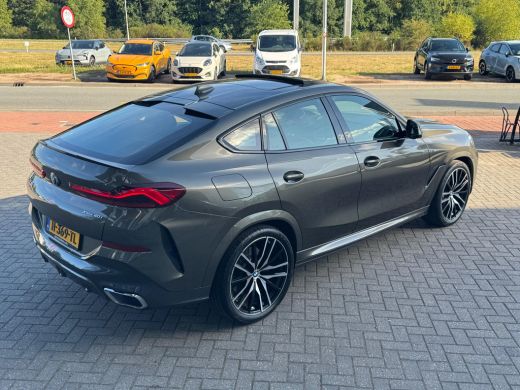 BMW X6 xDrive40i High Executive HUD | H&K | Pano | Luchtvering | 360 Camera | Stuurverwarming | Memory s... ActivLease financial lease