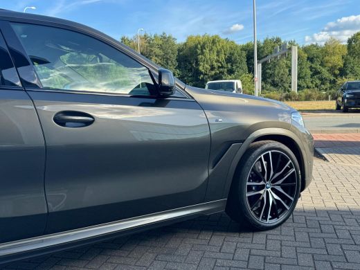 BMW X6 xDrive40i High Executive HUD | H&K | Pano | Luchtvering | 360 Camera | Stuurverwarming | Memory s... ActivLease financial lease