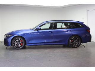 BMW 3 Serie Touring 330i xDrive High Executive M Sport Automaat / Panoramadak / Trekhaak / Sportstoelen / Ada...