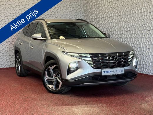 Hyundai Tucson 1.6 T-GDI PHEV 265PK 19''LMV 4WD LED STUUR/STOEL VERW. NAVI ELEK.KLEP 03/2024 PHEV PLUG IN HYBRID... Hyundai Tucson 1.6 T-GDI PHEV 265PK 19''LMV 4WD LED STUUR/STOEL VERW. NAVI ELEK.KLEP 03/2024 PHEV PLUG IN HYBRID...