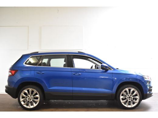 Skoda Karoq 1.5 TSI 150PK ACT BUSINESS EDITION PLUS CAMERA/NAVI/TREKHAAK ActivLease financial lease