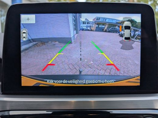 Ford Kuga 2.5 PHEV Titanium 225pk | Dodehoek | Winter Pack | Adap. Cruise | Elek. Trekhaak | 1e Eigenaar & ... ActivLease financial lease