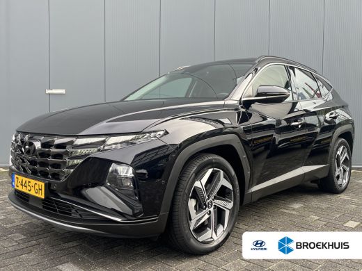 Hyundai Tucson 1.6 T-GDI 265pk PHEV Premium 4WD | Leder | Carplay | Climate | Keyless | Navigatie | Elek. Klep |... Hyundai Tucson 1.6 T-GDI 265pk PHEV Premium 4WD | Leder | Carplay | Climate | Keyless | Navigatie | Elek. Klep |...