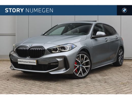 BMW 1 Serie 118i High Executive M Sport Automaat / Panoramadak / Sportstoelen / Achteruitrijcamera / Adaptiev... BMW 1 Serie 118i High Executive M Sport Automaat / Panoramadak / Sportstoelen / Achteruitrijcamera / Adaptiev...