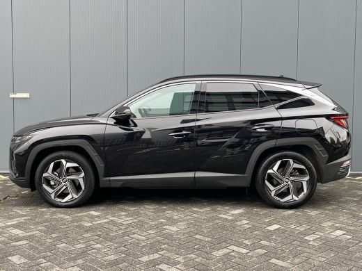 Hyundai Tucson 1.6 T-GDI 265pk PHEV Premium 4WD | Leder | Carplay | Climate | Keyless | Navigatie | Elek. Klep |... ActivLease financial lease