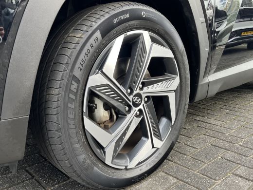 Hyundai Tucson 1.6 T-GDI 265pk PHEV Premium 4WD | Leder | Carplay | Climate | Keyless | Navigatie | Elek. Klep |... ActivLease financial lease