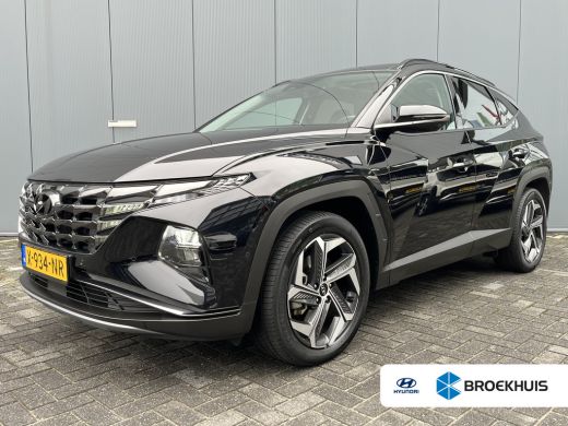 Hyundai Tucson 1.6 T-GDI 265pk PHEV Premium Sky 4WD | Leder | Carplay | Climate | Keyless | Navigatie | Elek. Kl... Hyundai Tucson 1.6 T-GDI 265pk PHEV Premium Sky 4WD | Leder | Carplay | Climate | Keyless | Navigatie | Elek. Kl...