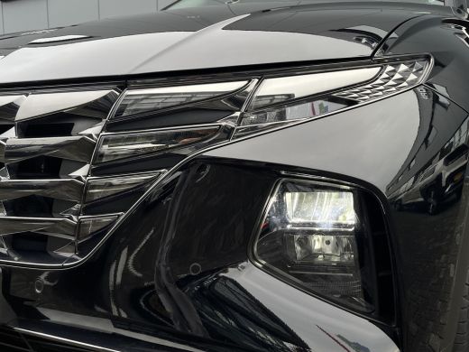 Hyundai Tucson 1.6 T-GDI 265pk PHEV Premium Sky 4WD | Leder | Carplay | Climate | Keyless | Navigatie | Elek. Kl... ActivLease financial lease