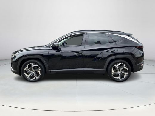 Hyundai Tucson 1.6 T-GDI PHEV Premium Sky 4WD | Rijklaarprijs! | Panoramadak | Stoel & stuurverwarming | Adaptie... ActivLease financial lease