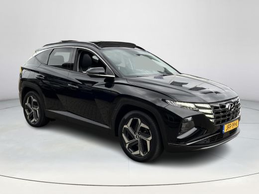 Hyundai Tucson 1.6 T-GDI PHEV Premium Sky 4WD | Rijklaarprijs! | Panoramadak | Stoel & stuurverwarming | Adaptie... ActivLease financial lease